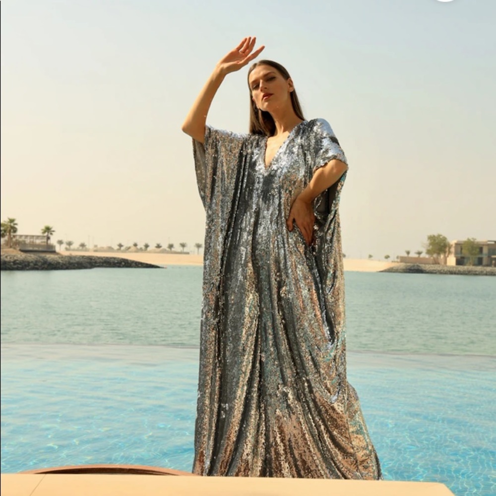 NALÈ silver sequin wide leg jumpsuit.